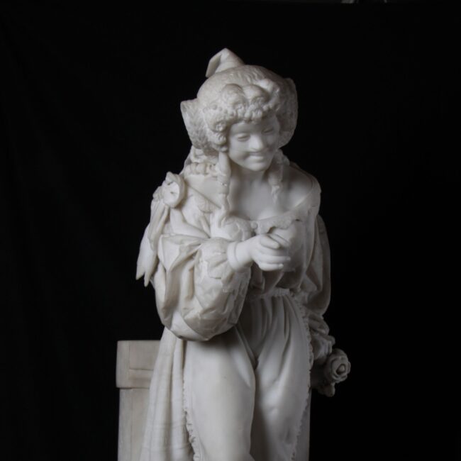 marble sculpture of a lady wearing a mask by Emilio Zocchi