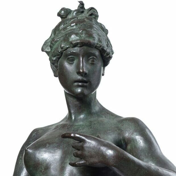 Bronze sculpture of a young woman