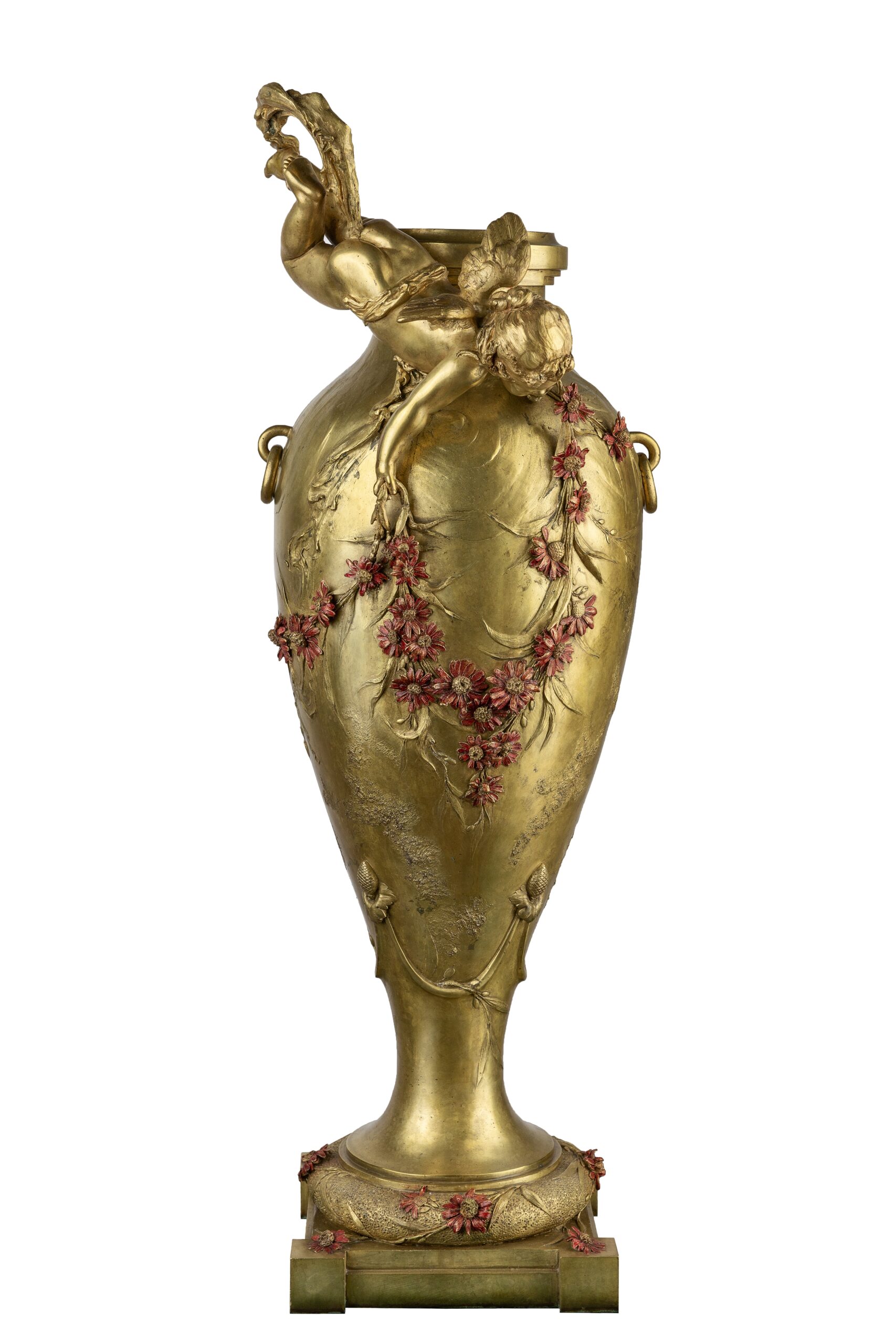 bronze vase with a cupid and red flowers