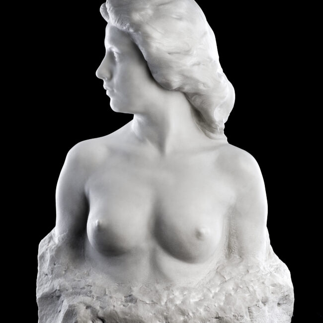alfred courtens sculpture of a woman looking to the right